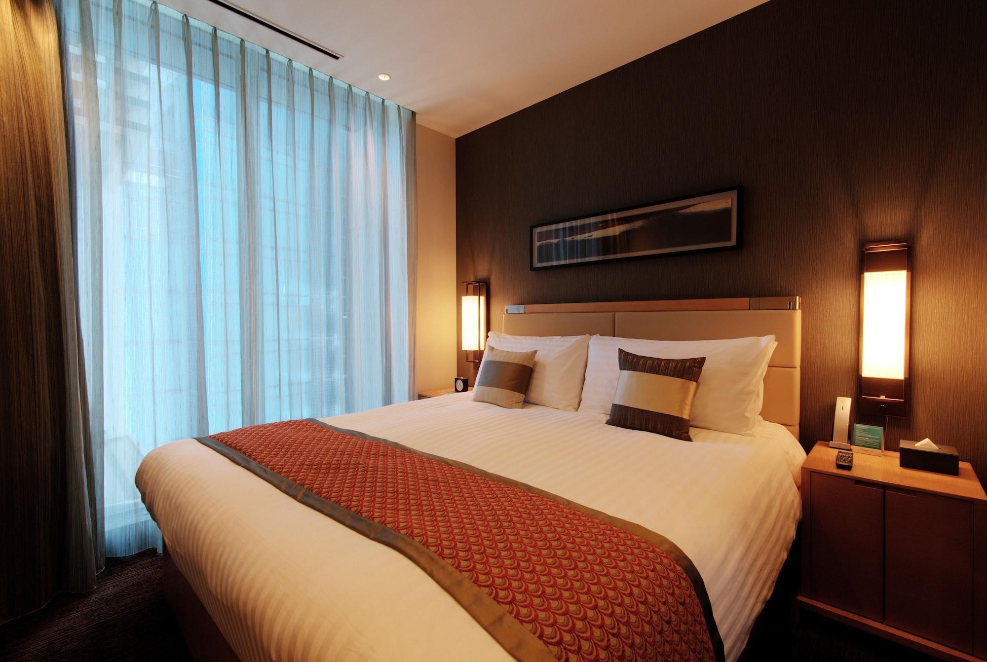 ホテル オークウッドプレミア東京 東京都 エクステリア 写真 A bedroom in a hotel
